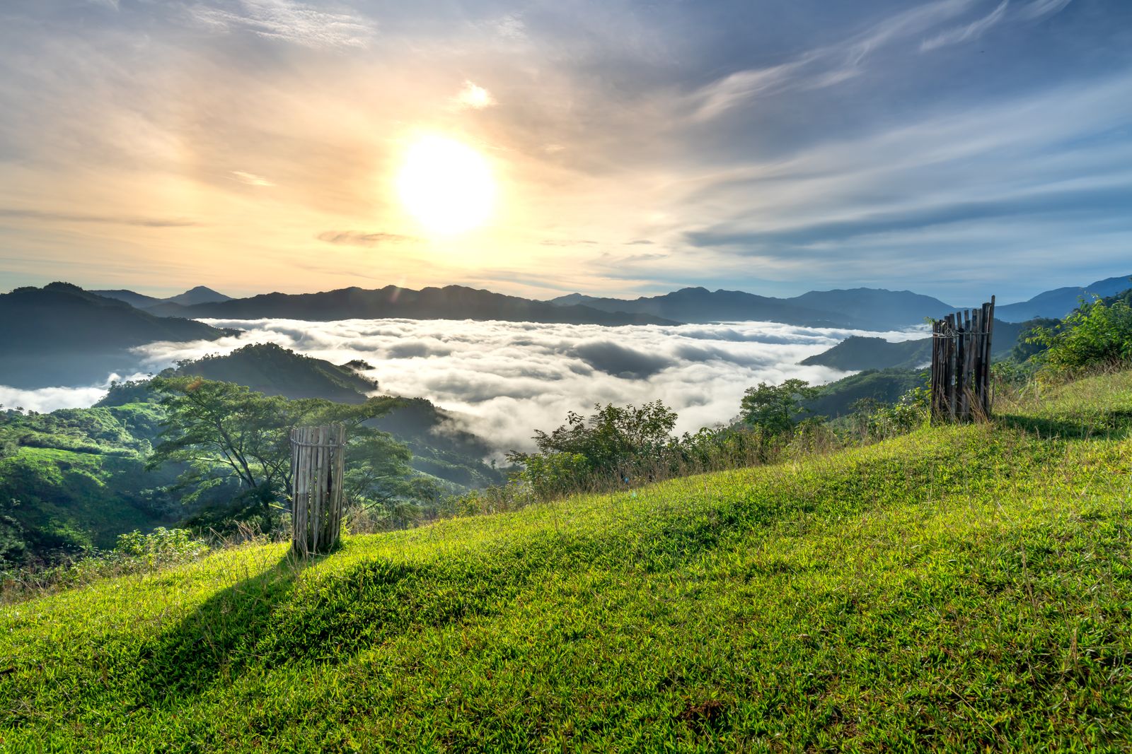 Sunrise over a misty mountain valley