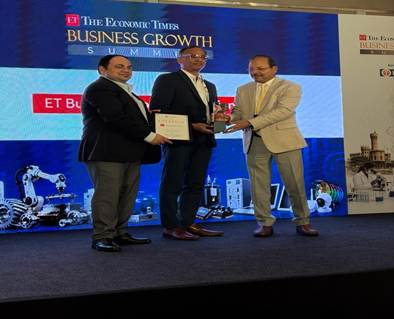 CEO Group Captain C.S. Krishnadas (Retd) receiving the Business Icons Award on stage at the ET Business Growth Summit, Bengaluru